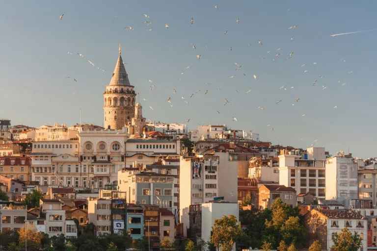 The Galata Tower rising above the city skyline of Istanbul, Turkey.