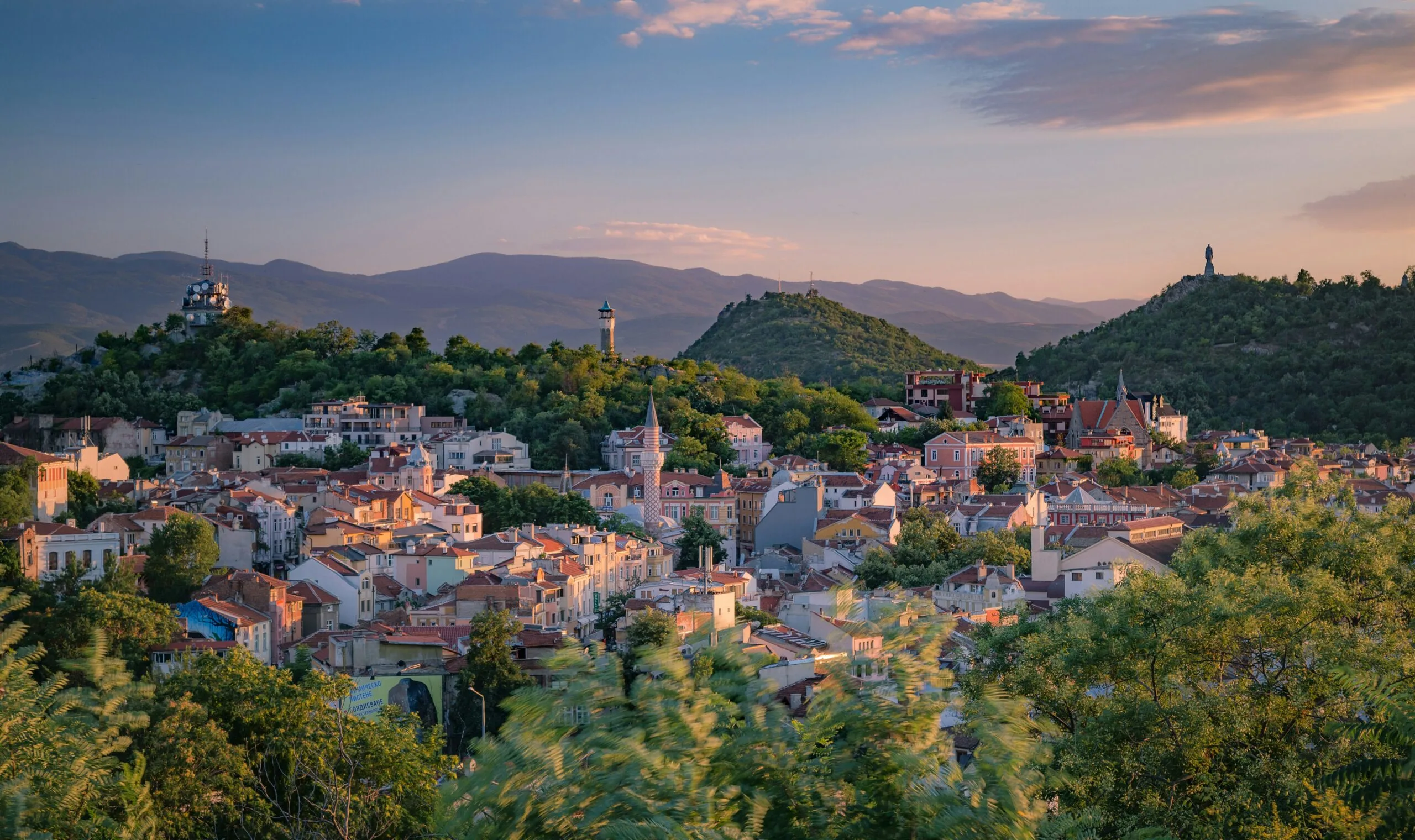 Bulgarian town on a hill at sunset