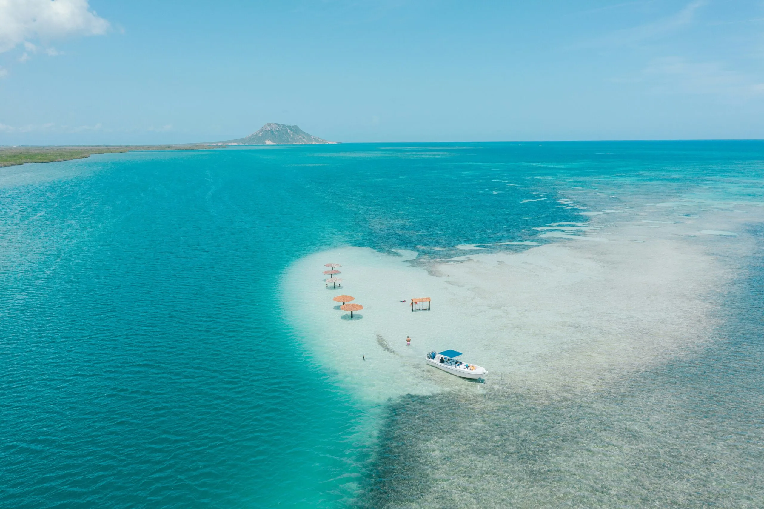 Sandbar in turquoise ocean water