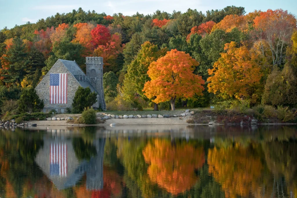 Autumn scene with colorful trees reflecting in a lake